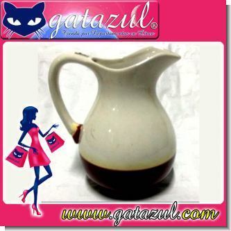 Read full article WHITE PORCELAIN VASE FOR BEVERAGES